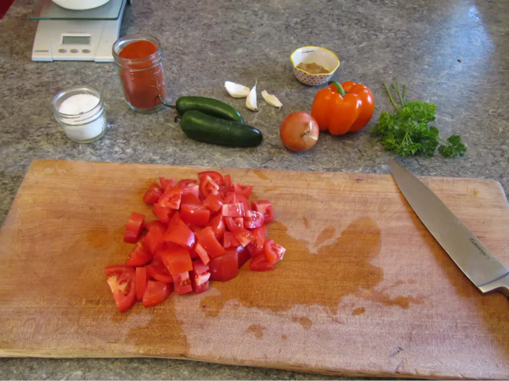 Chopped Tomatos on a cutting board