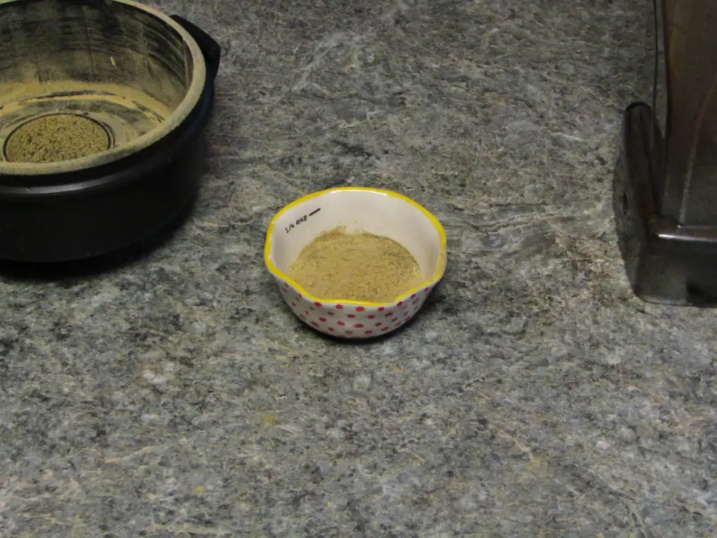 Dehydrated hot pepper powder in a small bowl