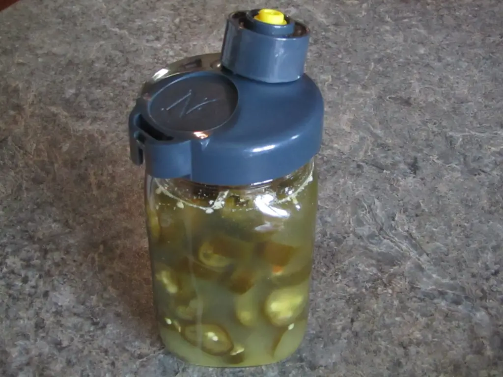 Jar of jalapenos with an airlock