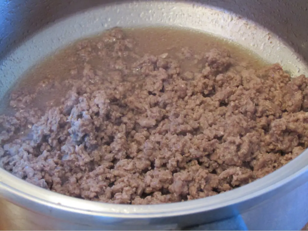 Browned ground beef in a pot