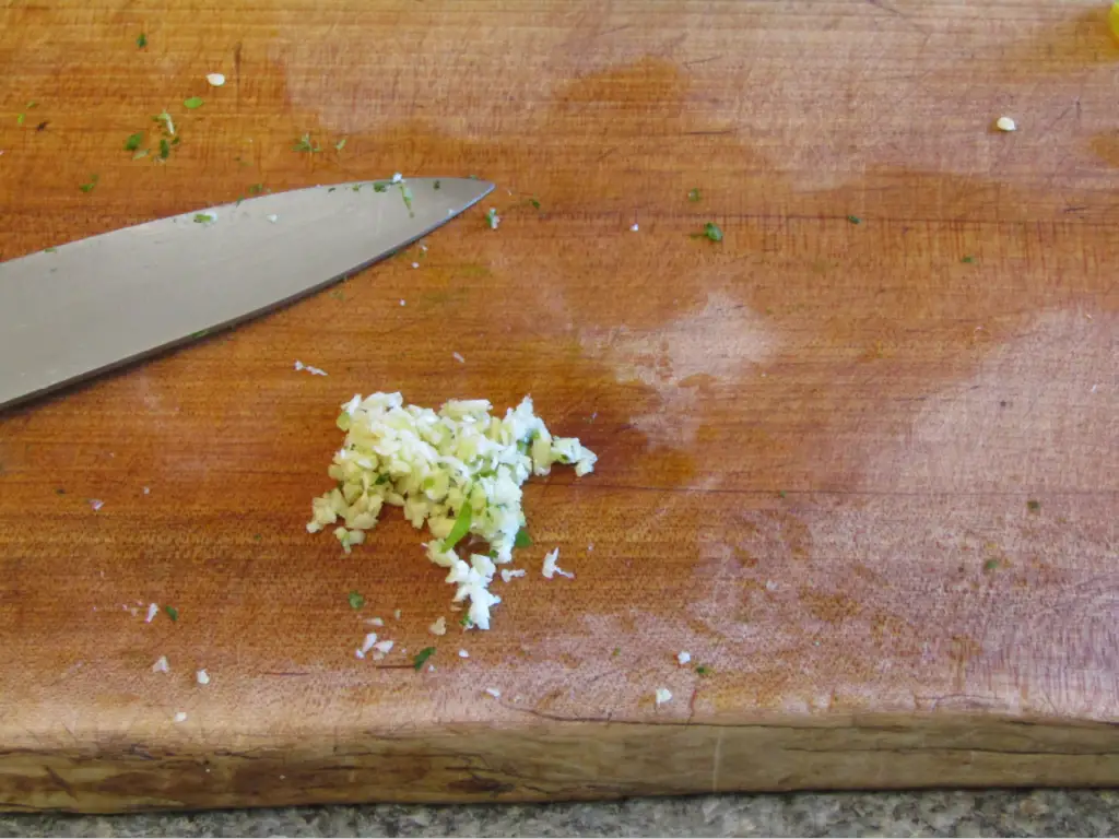 Miinced garlic for fresh salsa made with fermeted hot peppers